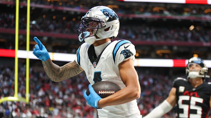 Carolina Panthers wide receiver Tetairoa McMillan (4) celebrates a touchdown in the fourth quarter 