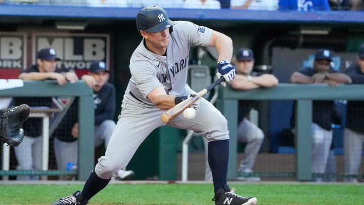 Jun 10, 2024; Kansas City, Missouri, USA; New York Yankees first baseman DJ LeMahieu (26) hits an RBI sacrifice bunt against the Kansas City Royals in the first inning at Kauffman Stadium. Mandatory Credit: Denny Medley-USA TODAY Sports Jun 10, 2024; Kansas City, Missouri, USA; New York Yankees first baseman DJ LeMahieu (26) hits an RBI sacrifice bunt against the Kansas City Royals in the first inning at Kauffman Stadium. Mandatory Credit: Denny Medley-USA TODAY Sports