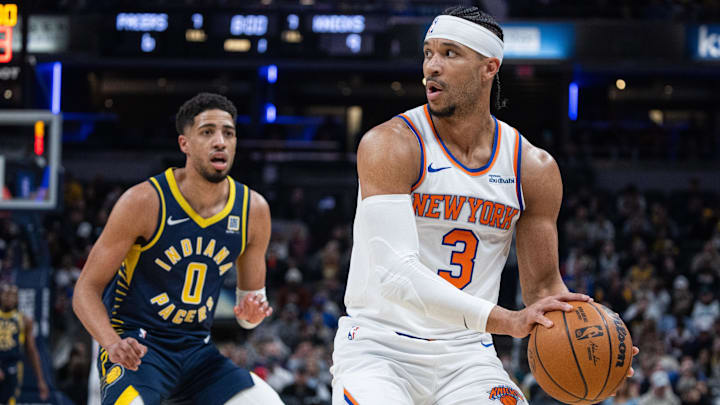 Feb 11, 2025; Indianapolis, Indiana, USA; New York Knicks guard Josh Hart (3) holds the ball while Indiana Pacers guard Tyrese Haliburton (0) defends in the first half at Gainbridge Fieldhouse. Mandatory Credit: Trevor Ruszkowski-Imagn Images