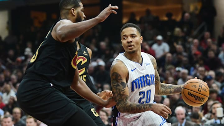 Then Magic guard Markelle Fultz (20) drives to the basket against Cavaliers center Tristan Thompson (13) in the 2024 playoffs.