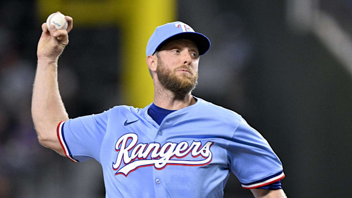 Sep 21, 2025; Arlington, Texas, USA; Texas Rangers starting pitcher Merrill Kelly (23) throws the ball during the first inning against the Miami Marlins at Globe Life Field. Mandatory Credit: Jerome Miron-Imagn Images
