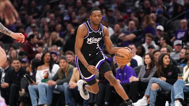 Mar 7, 2024; Sacramento, California, USA; Sacramento Kings guard De'Aaron Fox (5) dribbles the ball against the San Antonio Spurs in the second quarter at the Golden 1 Center. Mandatory Credit: Cary Edmondson-Imagn Images