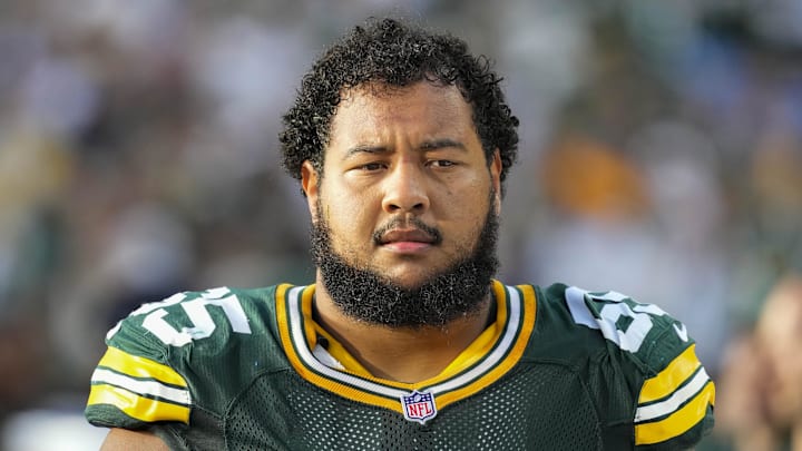 Sep 7, 2025; Green Bay, Wisconsin, USA;  Green Bay Packers guard Aaron Banks (65) during the game against the Detroit Lions at Lambeau Field. Mandatory Credit: Jeff Hanisch-Imagn Images