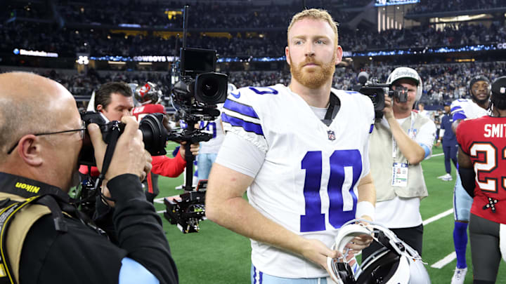 Dallas Cowboys quarterback Cooper Rush walks off the field after the game against the Tampa Bay Buccaneers.