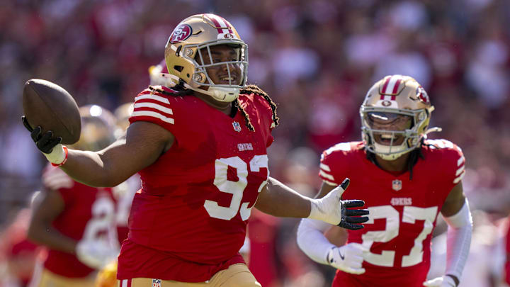 October 20, 2024; Santa Clara, California, USA; San Francisco 49ers defensive tackle Kalia Davis (93) celebrates an interception against the Kansas City Chiefs during the first quarter at Levi's Stadium. Mandatory Credit: Kyle Terada-Imagn Images