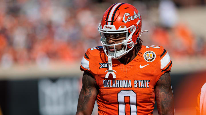 Oct 5, 2024; Stillwater, Oklahoma, USA; Oklahoma State Cowboys running back Ollie Gordon II (0) during a break in play in the first quarter against the West Virginia Mountaineers at Boone Pickens Stadium. Mandatory Credit: William Purnell-Imagn Images
