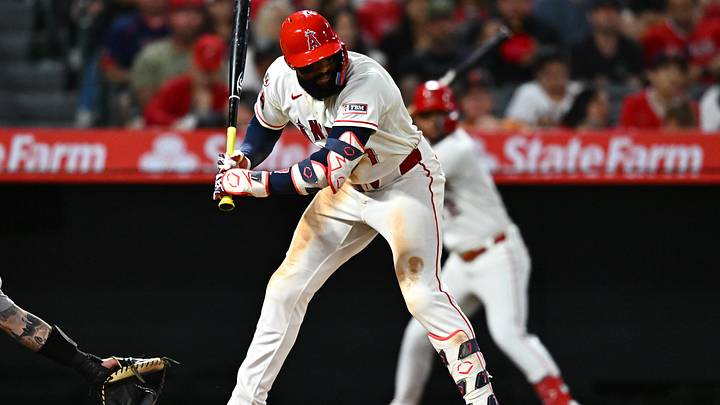 Jun 27, 2026; Anaheim, California, USA; Los Angeles Angels right fielder Jo Adell (7) is hit by a pitch during the eighth inning against the Athletics at Angel Stadium. Mandatory Credit: William Liang-Imagn Images