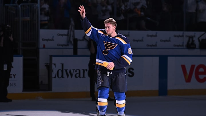 Mar 26, 2026; St. Louis, Missouri, USA; St. Louis Blues left wing Dylan Holloway (81) acknowledges fans after being named the first star of the game after beating the San Jose Sharks at Enterprise Center. Mandatory Credit: Joe Puetz-Imagn Images