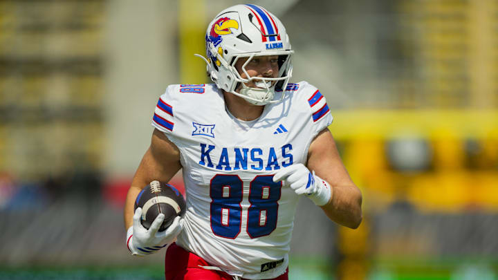 Sep 6, 2025; Columbia, Missouri, USA; Kansas Jayhawks tight end Boden Groen (88) runs with the ball during the first half against the Missouri Tigers at Faurot Field at Memorial Stadium. Mandatory Credit: Jay Biggerstaff-Imagn Images Sep 6, 2025; Columbia, Missouri, USA; Kansas Jayhawks tight end Boden Groen (88) runs with the ball during the first half against the Missouri Tigers at Faurot Field at Memorial Stadium. Mandatory Credit: Jay Biggerstaff-Imagn Images
