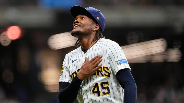 Aug 8, 2026; Milwaukee, Wisconsin, USA;  Milwaukee Brewers pitcher Abner Uribe (45) celebrates following the seventh inning against the Minnesota Twins at American Family Field. Mandatory Credit: Jeff Hanisch-Imagn Images