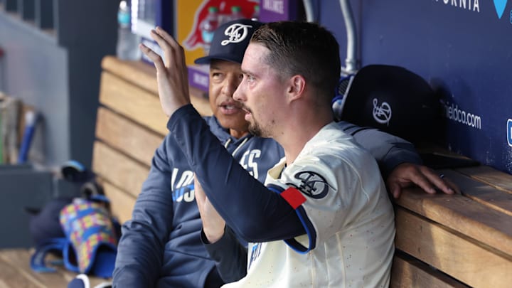 May 9, 2026; Los Angeles, California, USA;  Los Angeles Dodgers pitcher Blake Snell (7) talks with manager Dave Roberts (30) in the dugout in the fourth inning against the Atlanta Braves at Dodger Stadium. Mandatory Credit: Kiyoshi Mio-Imagn Images