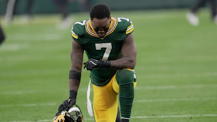 Green Bay Packers linebacker Quay Walker (7) takes a moment before their game against the San Francisco 49ers Sunday, November 24, 2024 at Lambeau Field in Green Bay, Wisconsin.