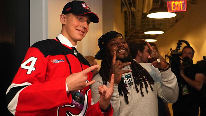 Former NFL player Marshawn Lynch poses for a photo with New Jersey Devils draft pick Anton Silayev during the 2024 NHL Draft at The Sphere. Mandatory Credit: Joe Camporeale-USA TODAY Sports Former NFL player Marshawn Lynch poses for a photo with New Jersey Devils draft pick Anton Silayev during the 2024 NHL Draft at The Sphere. Mandatory Credit: Joe Camporeale-USA TODAY Sports