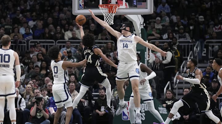 Milwaukee Bucks guard Andre Jackson Jr. (44) drives to the basket against Memphis Grizzlies center Zach Edey (14)