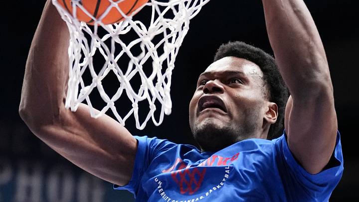Feb 23, 2026; Lawrence, Kansas, USA; Kansas Jayhawks center Paul Mbiya (34) warms up against the Houston Cougars prior to a game at Allen Fieldhouse. Mandatory Credit: Denny Medley-Imagn Images Feb 23, 2026; Lawrence, Kansas, USA; Kansas Jayhawks center Paul Mbiya (34) warms up against the Houston Cougars prior to a game at Allen Fieldhouse. Mandatory Credit: Denny Medley-Imagn Images