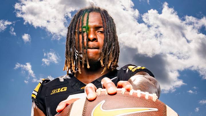 Running back Kaleb Johnson stands for a photo during the Iowa football media day in 2024. Running back Kaleb Johnson stands for a photo during the Iowa football media day in 2024.