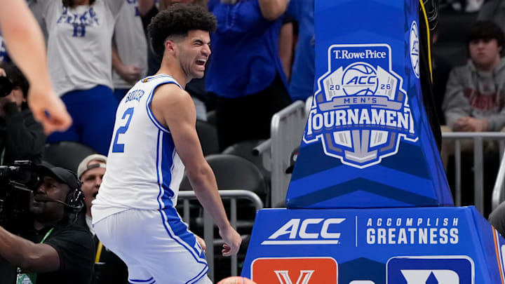 Mar 14, 2026; Charlotte, NC, USA; Duke Blue Devils guard Cayden Boozer (2) celebrates after a play against the Virginia Cavaliers during the men's ACC Conference Tournament Championship.