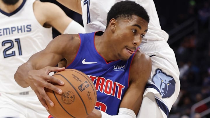 Dec 6, 2023; Detroit, Michigan, USA;  Detroit Pistons guard Jaden Ivey (23) dribbles defended by