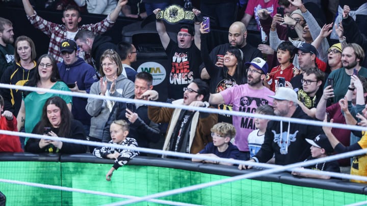 Fans cheer for Iowa native Seth Rollins before an in-ring promo at WWE Monday Night Raw at Wells Fargo Arena in Des Moines. Fans cheer for Iowa native Seth Rollins before an in-ring promo at WWE Monday Night Raw at Wells Fargo Arena in Des Moines.