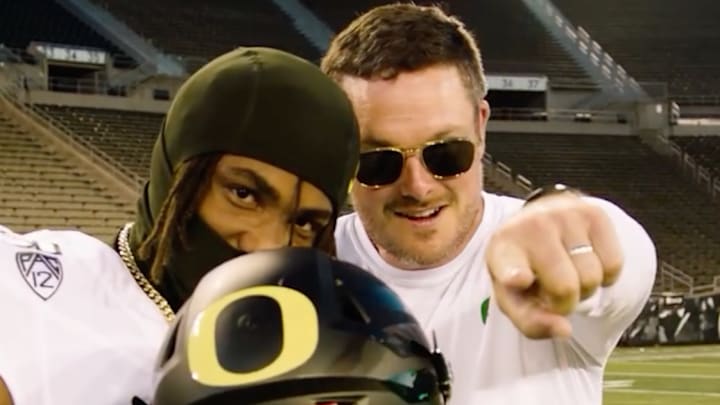 Oregon Ducks recruiting target Dallas Wilson and coach Dan Lanning in Autzen Stadium. Oregon Ducks recruiting target Dallas Wilson and coach Dan Lanning in Autzen Stadium.