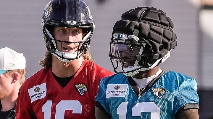 Jacksonville Jaguars Quarterback Trevor Lawrence (16) talks with Jacksonville Jaguars Cornerback/Wide Receiver Travis Hunter (12) after a pass play during the Jacksonville Jaguars 10th day of NFL Training Camp at the Miller Electric Center in Jacksonville, Fla., Sunday, August 9, 2026. 