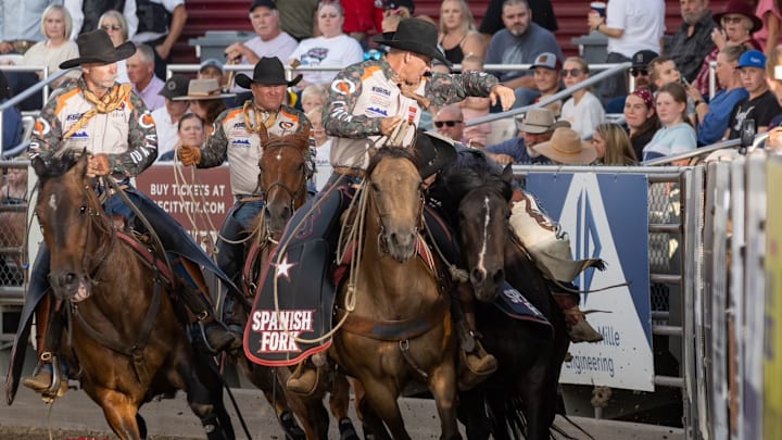Shawn Calhoun picking up at Spanish Fork Fiesta Days Rodeo