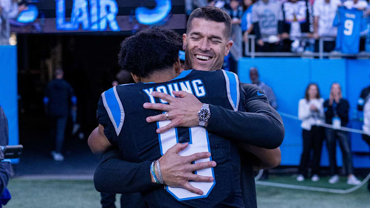 Nov 3, 2024; Charlotte, North Carolina, USA; Carolina Panthers head coach Dave Canales hugs quarterback Bryce Young (9) after getting the win against the New Orleans Saints at Bank of America Stadium. Nov 3, 2024; Charlotte, North Carolina, USA; Carolina Panthers head coach Dave Canales hugs quarterback Bryce Young (9) after getting the win against the New Orleans Saints at Bank of America Stadium.