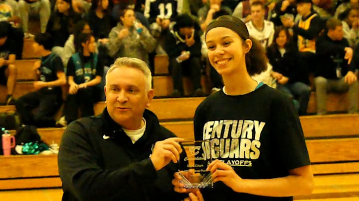 Century's Kiara Green is honored before the game for scoring her 1,000th career point Feb. 21 against Liberty. She had 27 points, 11 rebounds and seven blocked shots in the Jaguars' first-round win Tuesday over Mountainside. Century's Kiara Green is honored before the game for scoring her 1,000th career point Feb. 21 against Liberty. She had 27 points, 11 rebounds and seven blocked shots in the Jaguars' first-round win Tuesday over Mountainside.