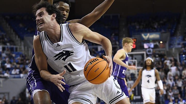 Nevada’s Nick Davidson drives while taking on Weber State at Lawlor Events Center in Reno on Nov. 13, 2024.