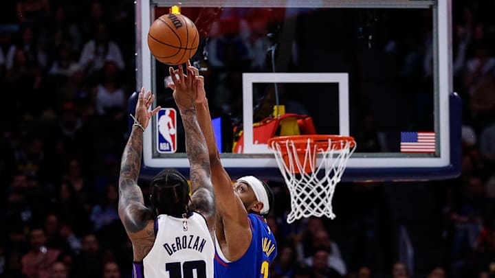 Mar 5, 2025; Denver, Colorado, USA; Denver Nuggets forward Zeke Nnaji (22) tips the shot of Sacramento Kings forward DeMar DeRozan (10) in the second quarter at Ball Arena. Mandatory Credit: Isaiah J. Downing-Imagn Images Mar 5, 2025; Denver, Colorado, USA; Denver Nuggets forward Zeke Nnaji (22) tips the shot of Sacramento Kings forward DeMar DeRozan (10) in the second quarter at Ball Arena. Mandatory Credit: Isaiah J. Downing-Imagn Images