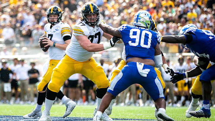 Iowa offensive lineman Connor Colby (77) blocks for quarterback Spencer Petras (7) during a NCAA college football game in the Vrbo Citrus Bowl against Kentucky, Saturday, Jan. 1, 2022, at Camping World Stadium in Orlando, Fla.
220101 Iowa Kentucky Citrus Fb Extra 022 Jpg Iowa offensive lineman Connor Colby (77) blocks for quarterback Spencer Petras (7) during a NCAA college football game in the Vrbo Citrus Bowl against Kentucky, Saturday, Jan. 1, 2022, at Camping World Stadium in Orlando, Fla.
220101 Iowa Kentucky Citrus Fb Extra 022 Jpg
