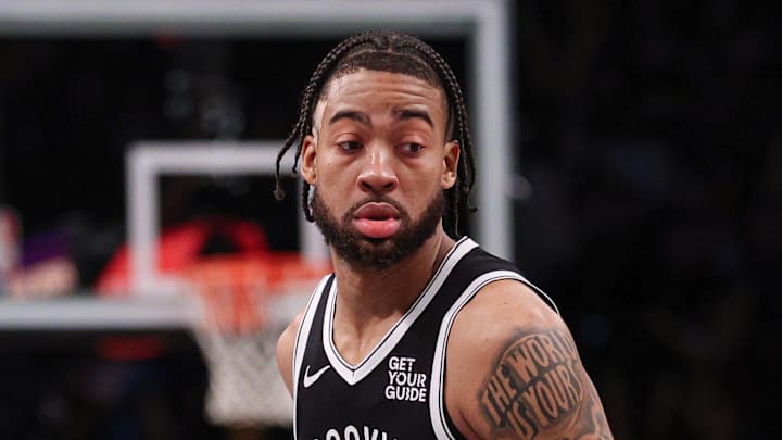 Apr 13, 2025; Brooklyn, New York, USA;  Brooklyn Nets forward Trendon Watford (9) dribbles up court during the second half against the New York Knicks at Barclays Center. Mandatory Credit: Vincent Carchietta-Imagn Images