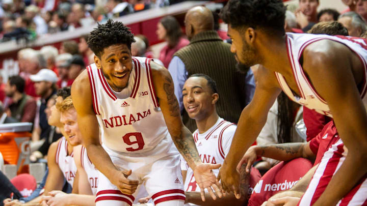 Indiana's Kanaan Carlyle (9) smiles as he exits the game during the Indiana versus Minnesota men's basketball game at Simon Skjodt Assembly Hall on Monday, Dec. 9, 2024.