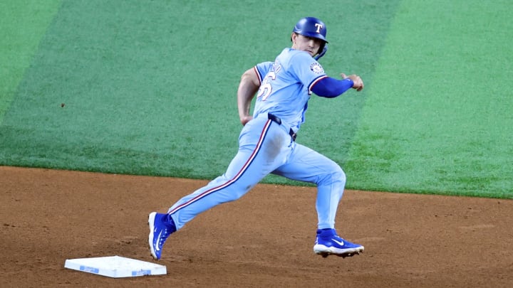 Jul 7, 2024; Arlington, Texas, USA; Texas Rangers left fielder Wyatt Langford (36) rounds the bases after a hit in the fourth inning against the Tampa Bay Rays at Globe Life Field. Mandatory Credit: Tim Heitman-USA TODAY Sports