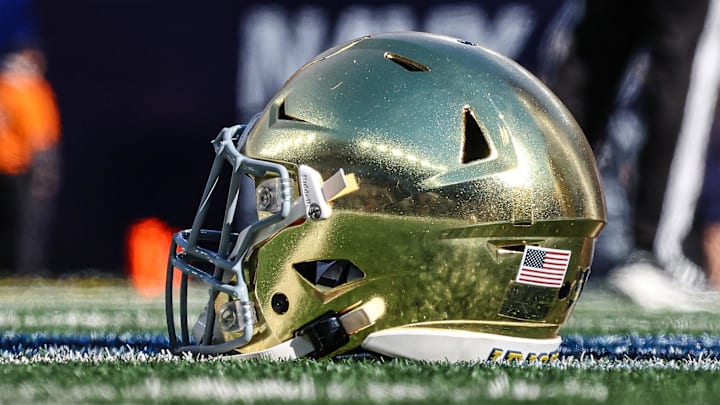 Oct 26, 2024; East Rutherford, New Jersey, USA; A Notre Dame Fighting Irish helmets rests on the field before the game between the Fighting Irish and the Navy Midshipmen at MetLife Stadium. Mandatory Credit: Vincent Carchietta-Imagn Images
