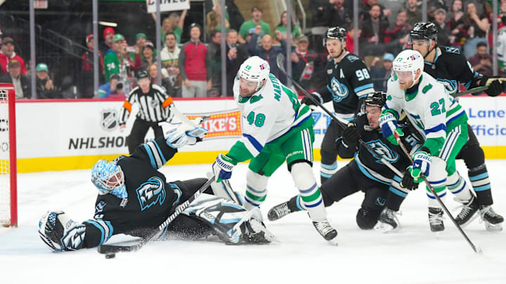 Jan 29, 2026; Raleigh, North Carolina, USA; Carolina Hurricanes left wing Jordan Martinook (48) misses on his scoring attempt against Utah Mammoth goaltender Karel Vejmelka (70) during the third period at Lenovo Center. Mandatory Credit: James Guillory-Imagn Images Jan 29, 2026; Raleigh, North Carolina, USA; Carolina Hurricanes left wing Jordan Martinook (48) misses on his scoring attempt against Utah Mammoth goaltender Karel Vejmelka (70) during the third period at Lenovo Center. Mandatory Credit: James Guillory-Imagn Images