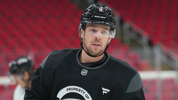Jun 1, 2026; Raleigh, North Carolina, USA; Carolina Hurricanes defenseman Mike Reilly (6) looks on during the practice during media day for the 2026 Stanley Cup Final at Lenovo Center. Mandatory Credit: James Guillory-Imagn Images Jun 1, 2026; Raleigh, North Carolina, USA; Carolina Hurricanes defenseman Mike Reilly (6) looks on during the practice during media day for the 2026 Stanley Cup Final at Lenovo Center. Mandatory Credit: James Guillory-Imagn Images