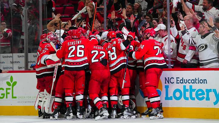 May 11, 2023; Raleigh, North Carolina, USA; Carolina Hurricanes players celebrate their overtime victory against the New Jersey Devils in game five of the second round of the 2023 Stanley Cup Playoffs at PNC Arena. Mandatory Credit: James Guillory-USA TODAY Sports May 11, 2023; Raleigh, North Carolina, USA; Carolina Hurricanes players celebrate their overtime victory against the New Jersey Devils in game five of the second round of the 2023 Stanley Cup Playoffs at PNC Arena. Mandatory Credit: James Guillory-USA TODAY Sports