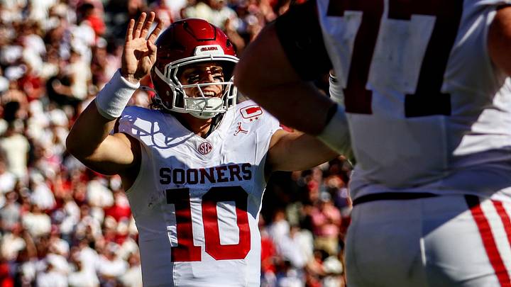 Oklahoma quarterback John Mateer prepares for a snap against Georgia. Oklahoma quarterback John Mateer prepares for a snap against Georgia.
