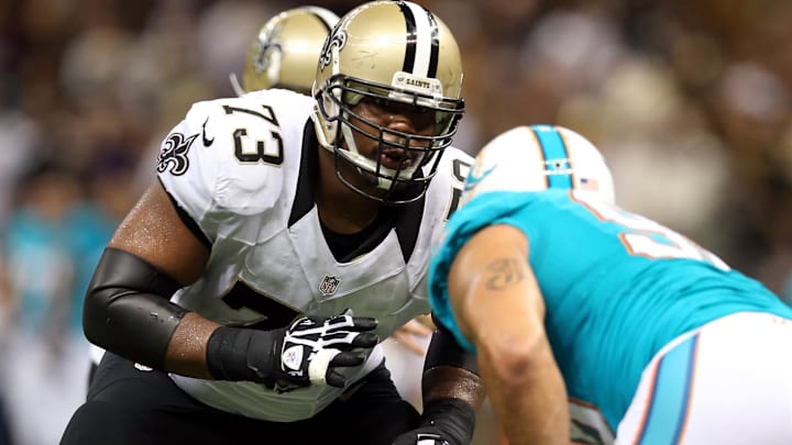 Sep 30, 2013; New Orleans Saints guard Jahri Evans (73) blocks against the Miami Dolphins