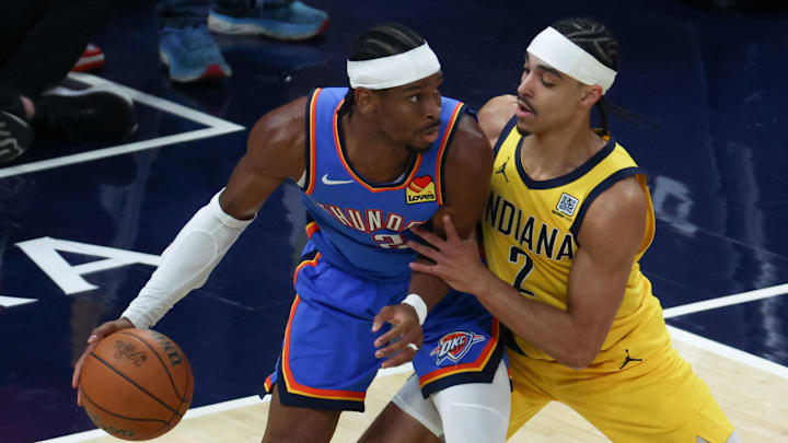 Jun 19, 2025; Indianapolis, Indiana, USA; Indiana Pacers guard Andrew Nembhard (2) defends against Oklahoma City Thunder guard Shai Gilgeous-Alexander (2) in the first quarter during game six of the 2025 NBA Finals at Gainbridge Fieldhouse. Mandatory Credit: Trevor Ruszkowski-Imagn Images Jun 19, 2025; Indianapolis, Indiana, USA; Indiana Pacers guard Andrew Nembhard (2) defends against Oklahoma City Thunder guard Shai Gilgeous-Alexander (2) in the first quarter during game six of the 2025 NBA Finals at Gainbridge Fieldhouse. Mandatory Credit: Trevor Ruszkowski-Imagn Images
