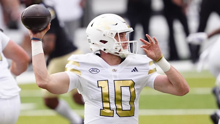 Aug 29, 2025; Boulder, Colorado, USA; Georgia Tech Yellow Jackets quarterback Haynes King (10) prepares to pass in the first quarter against the Colorado Buffaloes at Folsom Field. Mandatory Credit: Ron Chenoy-Imagn Images