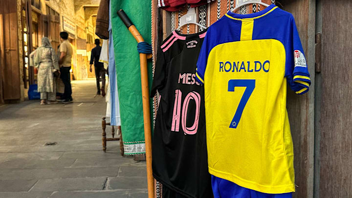 QATAR-FBL-MESSI-RONALDO