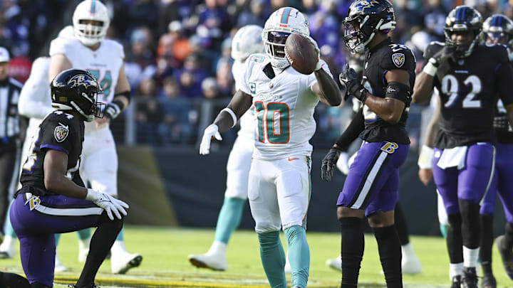 Dec 31, 2023; Baltimore, Maryland, USA;  Miami Dolphins wide receiver Tyreek Hill (10) reacts after making a first down against the Baltimore Ravens during the first half at M&T Bank Stadium. Mandatory Credit: Tommy Gilligan-Imagn Images
