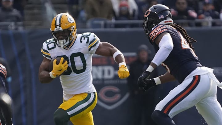 Green Bay Packers running back Chris Brooks (30) runs the ball against the Chicago Bears on Sunday.