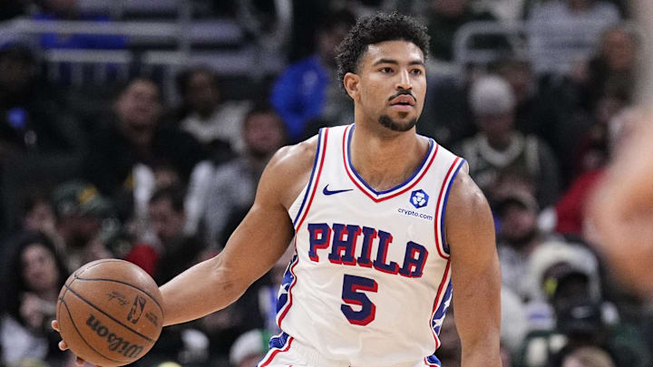Dec 5, 2025; Milwaukee, Wisconsin, USA; Philadelphia 76ers guard Quentin Grimes (5) brings the ball up the court against Milwaukee Bucks in the second half at Fiserv Forum. Mandatory Credit: Michael McLoone-Imagn Images