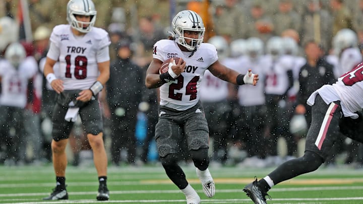 Oct 14, 2023; West Point, New York, USA; Troy Trojans running back Damien Taylor (24) carries the ball against the Army Black Knights during the first half at Michie Stadium. Mandatory Credit: Danny Wild-Imagn Images