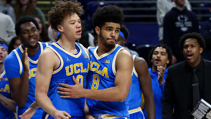 Jan 14, 2026; University Park, Pennsylvania, USA; UCLA Bruins guard Trent Perry (0) is congratulated by guard Eric Freeny (8) after scoring a basket during the second half against the Penn State Nittany Lions at Bryce Jordan Center. Mandatory Credit: Matthew O'Haren-Imagn Images