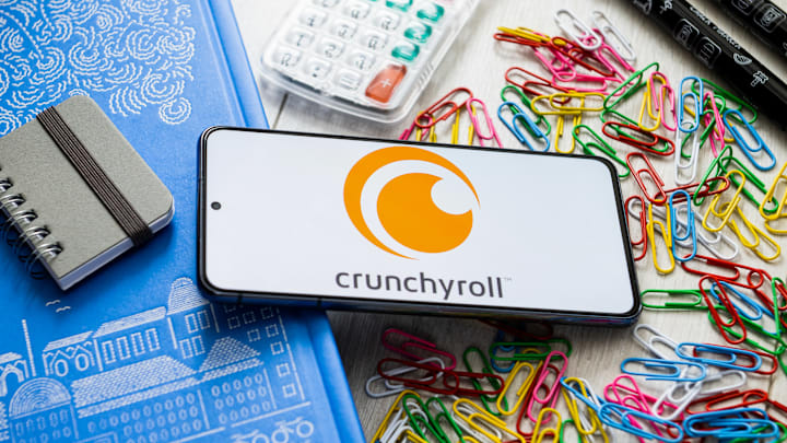 In this photo illustration, a Crunchyroll logo seen...