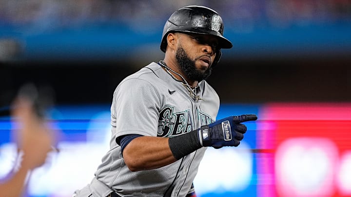 Seattle Mariners designated hitter Carlos Santana runs after hitting a home run against the Toronto Blue Jays in a Wild Card Game on Oct. 8, 2022, at Rogers Centre. Seattle Mariners designated hitter Carlos Santana runs after hitting a home run against the Toronto Blue Jays in a Wild Card Game on Oct. 8, 2022, at Rogers Centre.